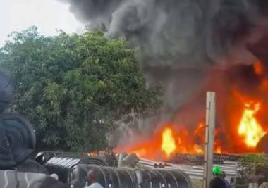 Fire outbreak at a property with thick black smoke and flames