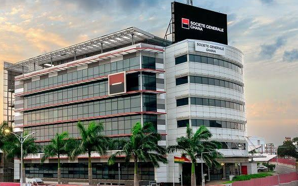 Banking professionals reviewing financial portfolios at a regional office in Accra Ghana