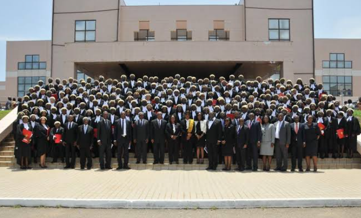 Judicial officers and legal dignitaries processing into the auditorium in Accra Ghana