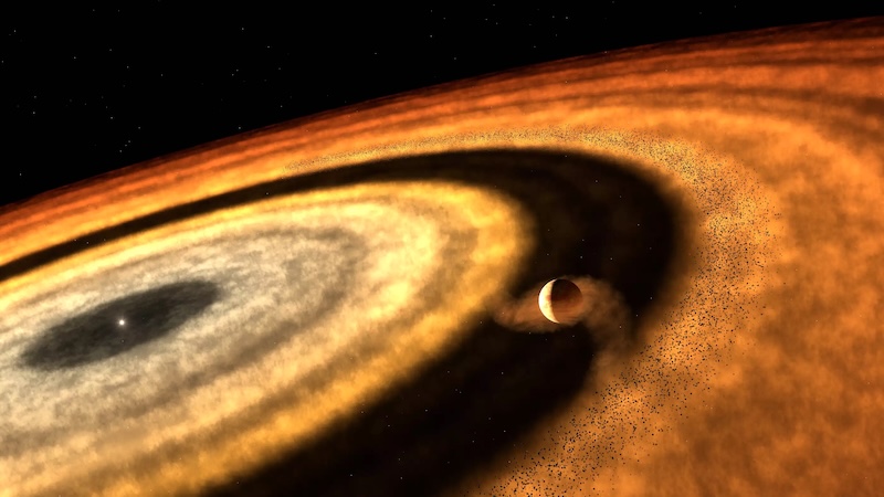 An artistic visualization of distant exoplanets orbiting a star in deep space. Photo via NASA