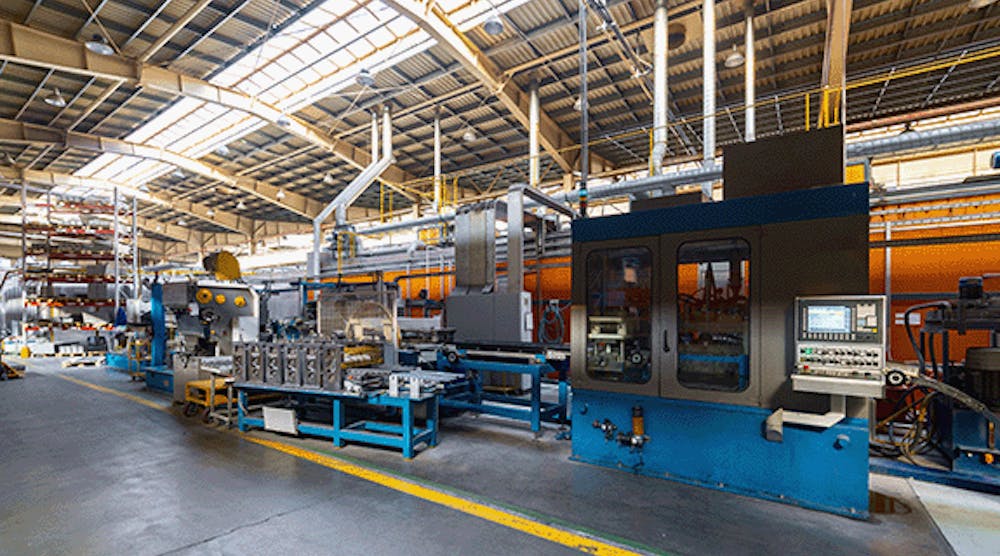 Industrial manufacturing machinery operating inside a modern production plant.