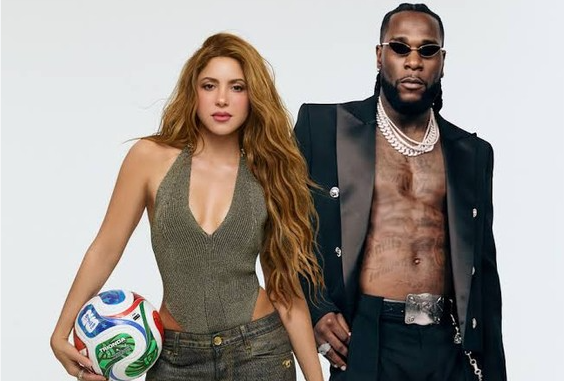 Burna Boy and Shakira posing