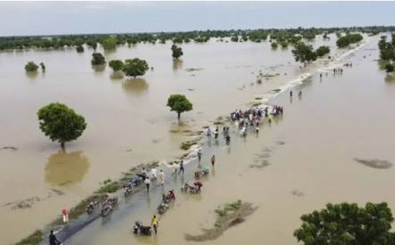 Municipal drainage inspection teams clearing blocked canals in Lagos, Nigeria