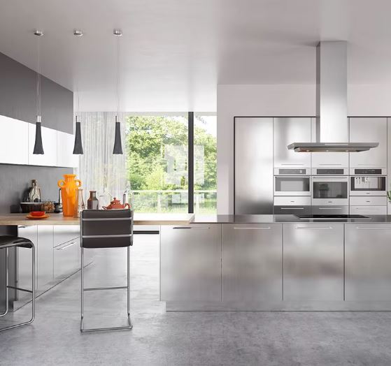Modern food preparation kitchen with stainless steel preparation counters.