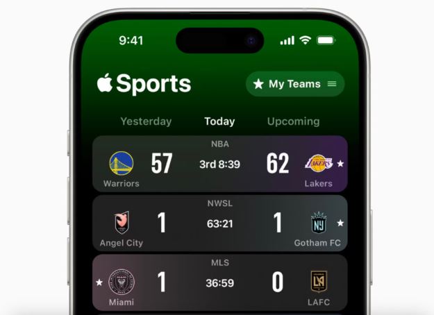 Close-up of a mobile phone showing sports scores on screen.