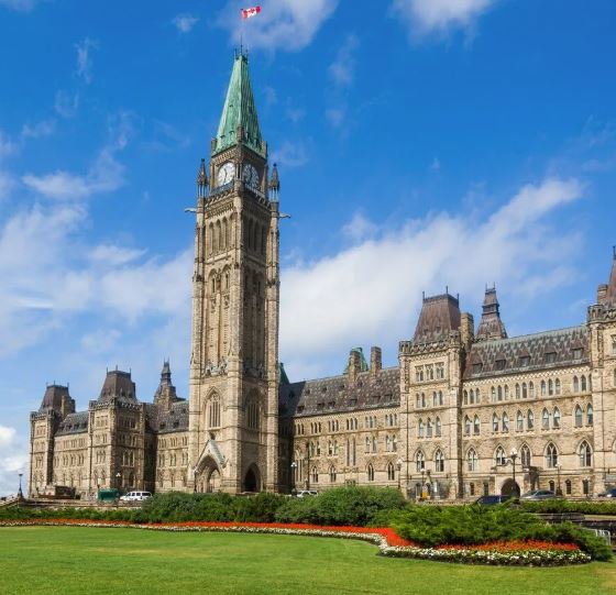 xterior view of the Centre Block and Peace Tower at Parliament Hill in Ottawa.