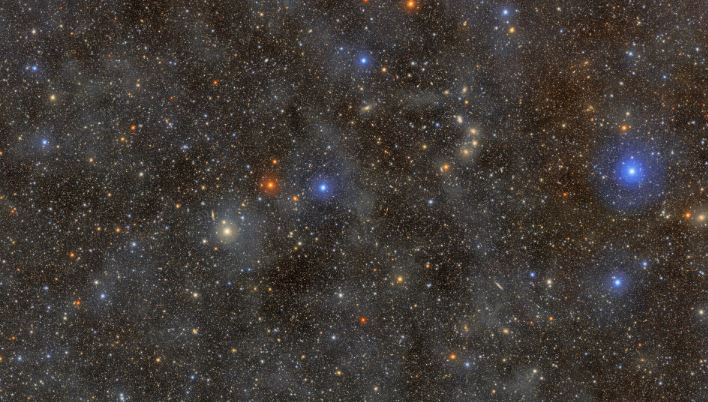 Wide-angle view of a star-filled night sky captured by an observatory telescope.